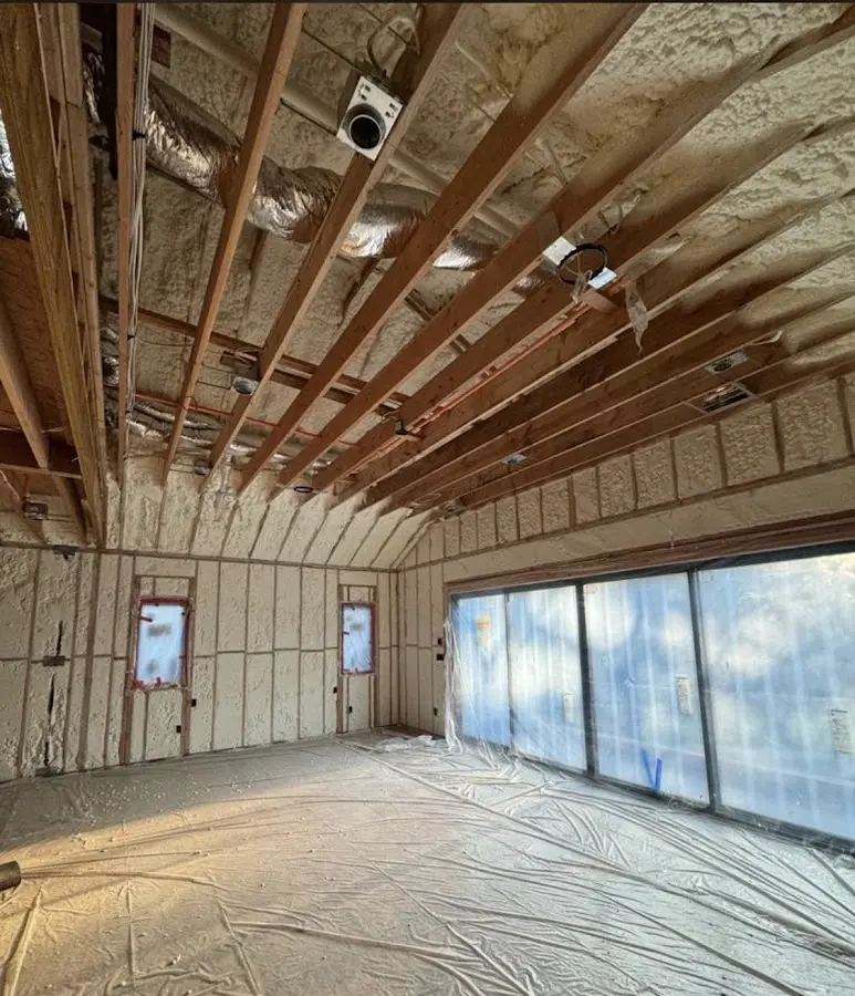 Interior walls and ceiling insulated with spray foam during new construction in Mamaroneck